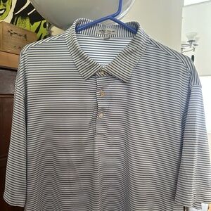 Peter Millar Blue and White Striped Polo Shirt. Buoy stripe. Three buttons.